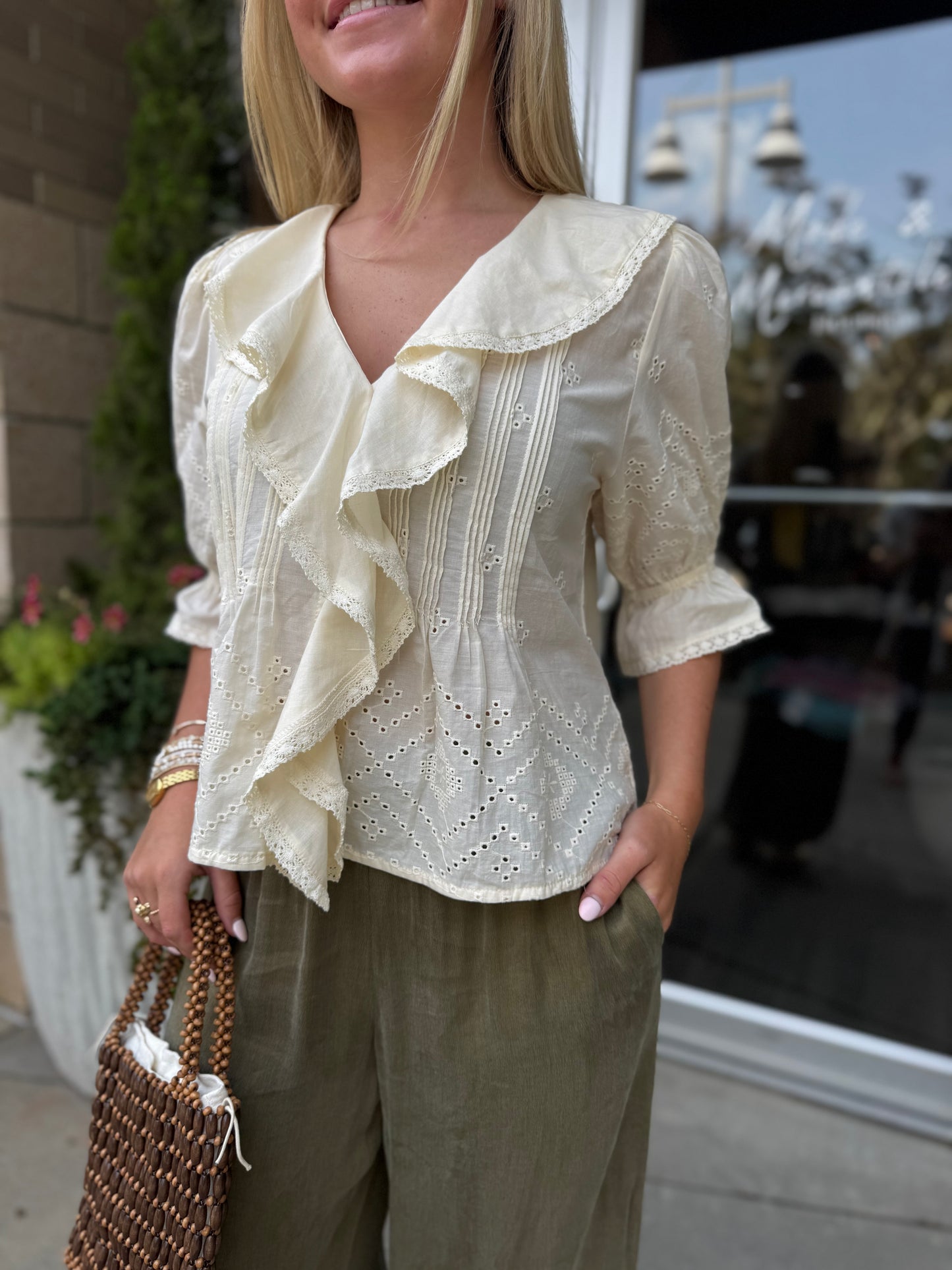 Eyelet Ruffle Front Blouse